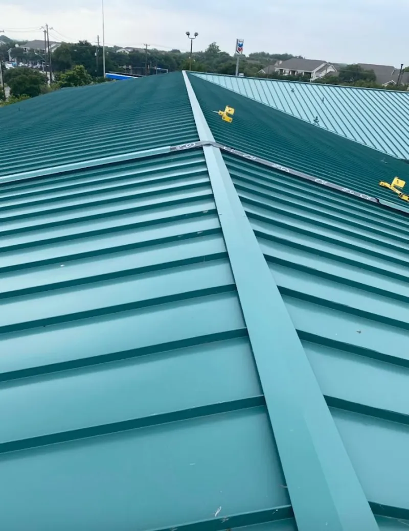 Green commercial metal roof ridge and valley for Metal Roof Repair in Mims